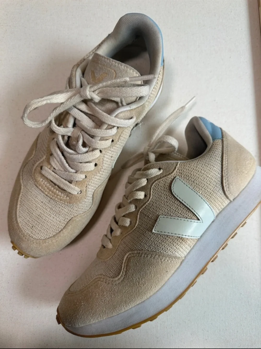 Neutral Beige Retro Runner Sneakers with Pale Blue Accent